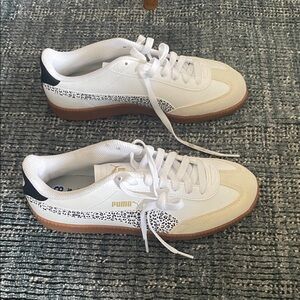 Puma White and Black Sneakers with Gold Logo